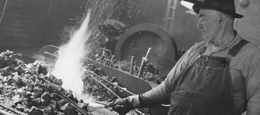 Blacksmith at his forge Blacksmith at his forge